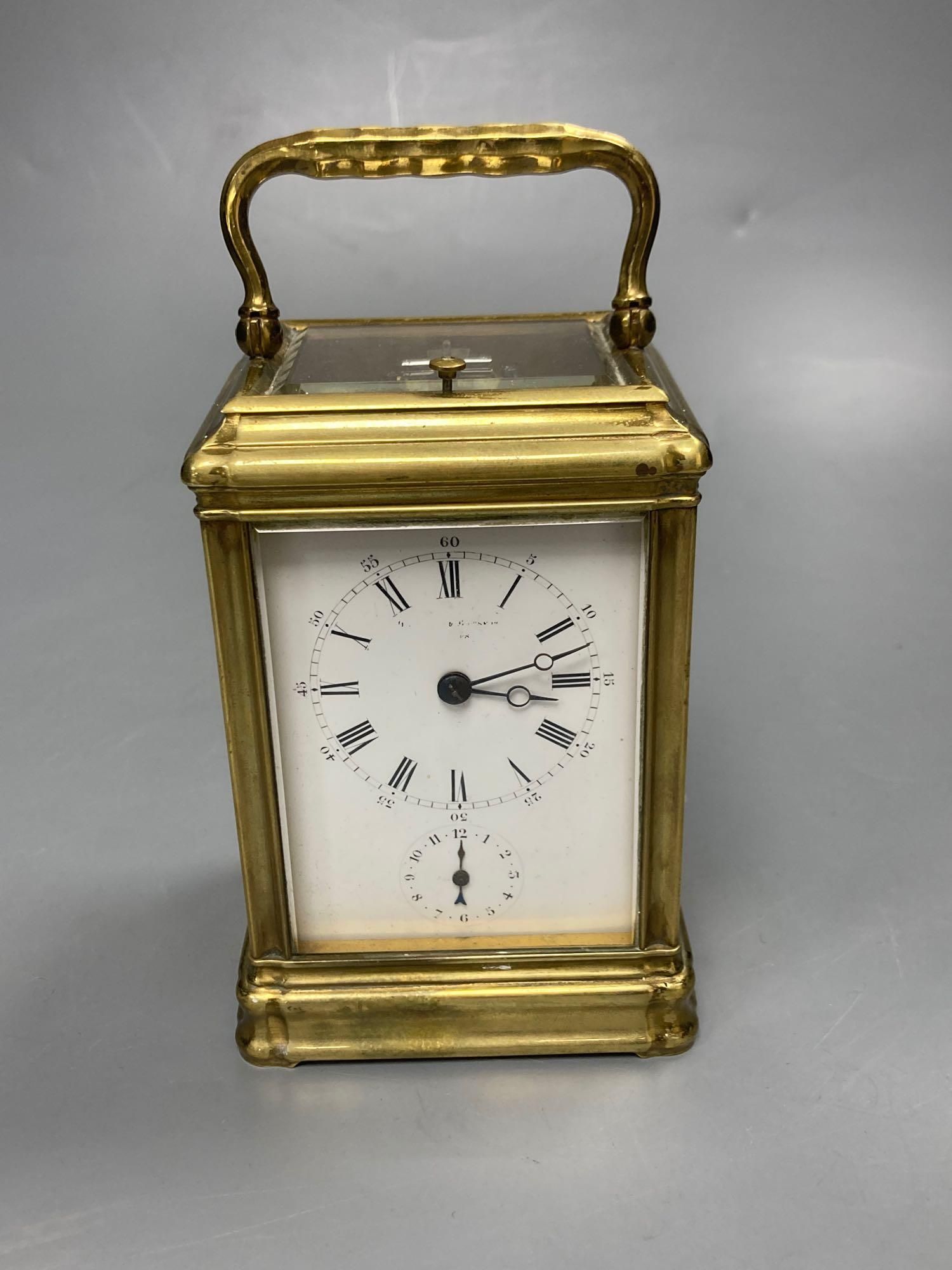 A brass repeating carriage clock- Drocourt, in gorge case, 16cm high including handle
